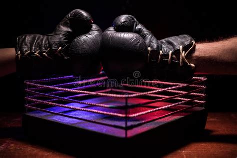 Empty Boxing Ring With Red Ropes For Match In The Stadium Arena