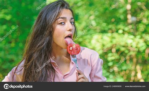 Lady Attractive Brunette Eats Tomato Seductive Appetite Her Appetite Is Sexy Woman Full Of