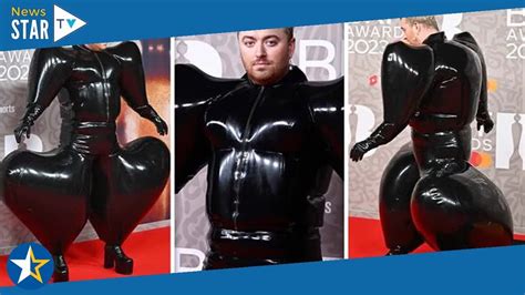 Sam Smith Makes An Entrance In Bold Latex Jumpsuit At Brit Awards 2023