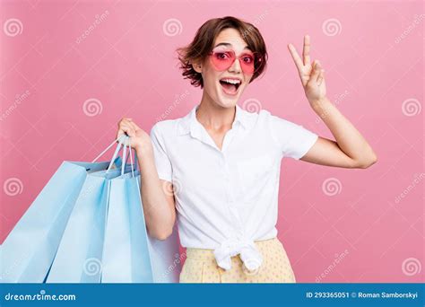 Portrait Of Cheerful Woman With Short Hairstyle Wear Stylish Blouse In Sunglass Hold Outfit Show