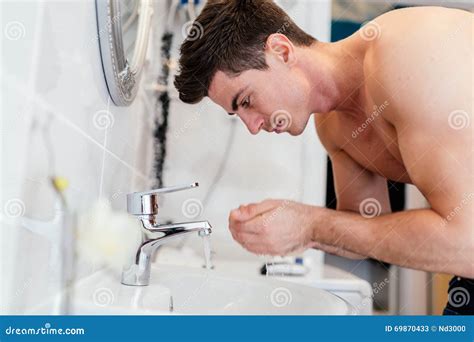 Handsome Man Washing Face In Bathroom Stock Image Image Of Lifestyle