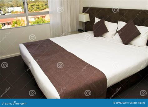 Large King Size Luxury Hotel Bed Stock Photo - Image: 25987630