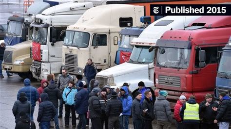 Russian Truckers Irate Over New Tolls Block Roads Near Moscow The