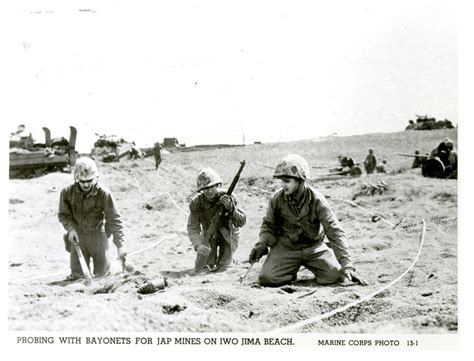 Three Us Marines Checking For Mines In Iwo Jima In February The