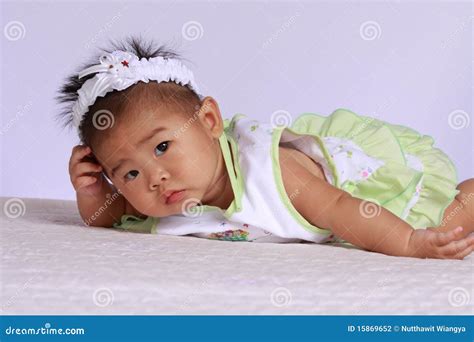 Suspicious Asian Baby Stock Photo Image Of Asian Propping 15869652