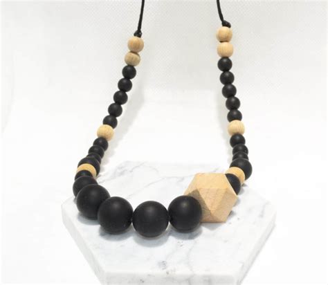 Collier Bijou Silicone De Dentition Noir Et Bois Super Id Es Cadeaux