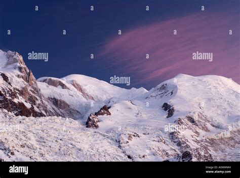 Pink Cloud And Evening Light Over Mont Blanc Massif Chamonix Mont