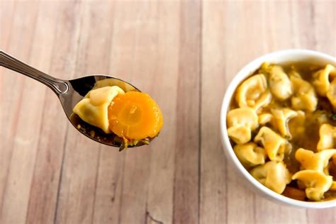 Premium Photo | Cappelletti soup tablespoonful of cappelletti italian pasta