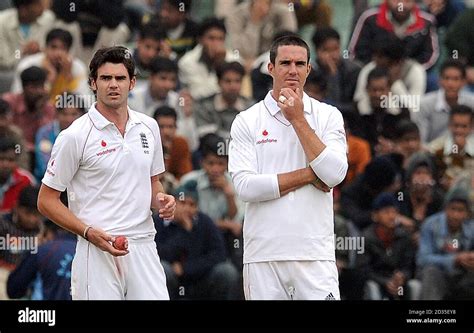 England S James Anderson And Kevin Pietersen Look On During The Second