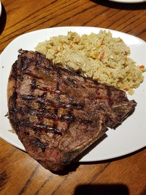 22oz Porterhouse, cooked rare. So good. : r/steak