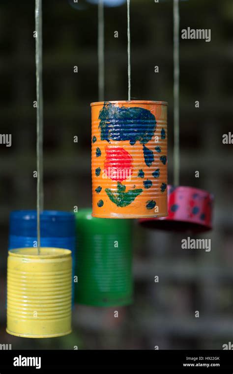 Wind Chimes Made From Recycled Tin Cans Stock Photo Alamy