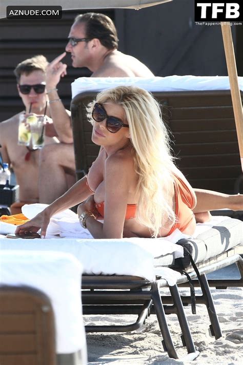 Victoria Silvstedt Lounges Beachside In Miami In An Orange Two Piece Bikini AZNude