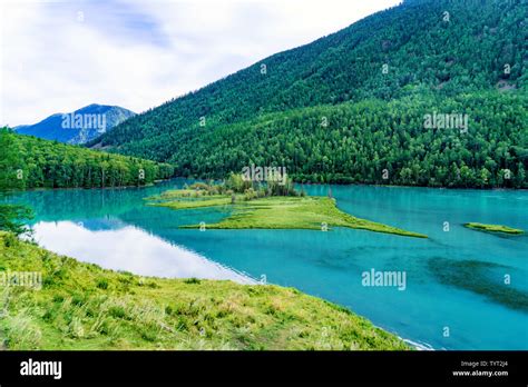 Kanas Lake Wolong Bay Xinjiang summer Stock Photo - Alamy