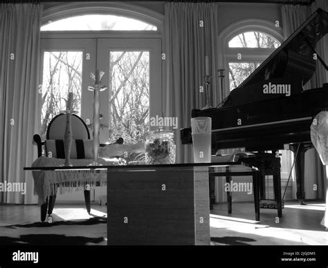 Black and White Elegant Living Room with Baby Grand Piano Stock Photo - Alamy