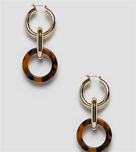 You're About to See These 22 Chain Earrings Everywhere | Who What Wear