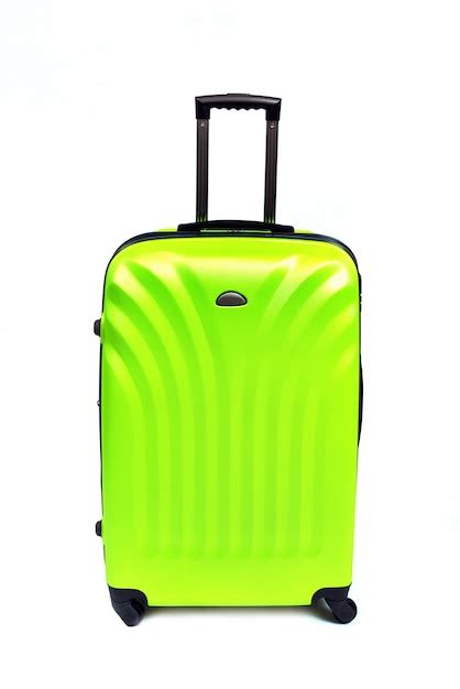 Premium Photo | Green suitcase isolated on white