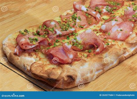 Focaccia Called PINSA In Italian With Mortadella Sausage And Green