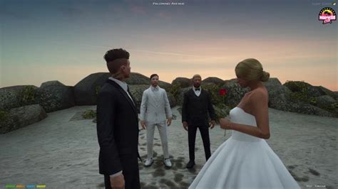 A Bride And Groom Are Standing In Front Of Two Other Men On The Beach