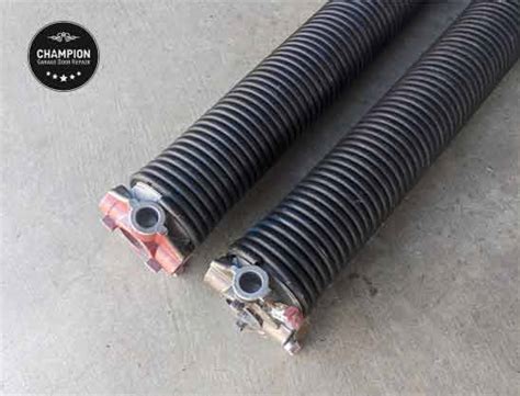 Garage Door Torsion Springs Everything You Need To Know Champion Garage Door Repair