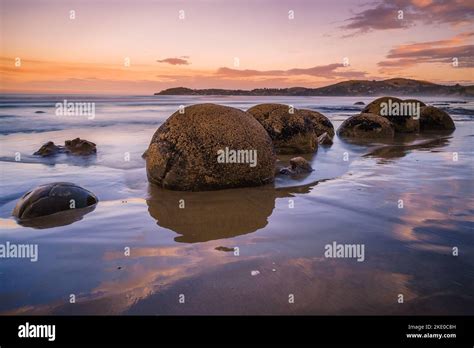 The Round Stones On The Water S Surface Moeraki Boulders Beach