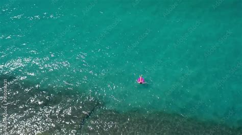 Aerial Top View Of Long Sexy Girl Swimming With Pink Swimming Mattress