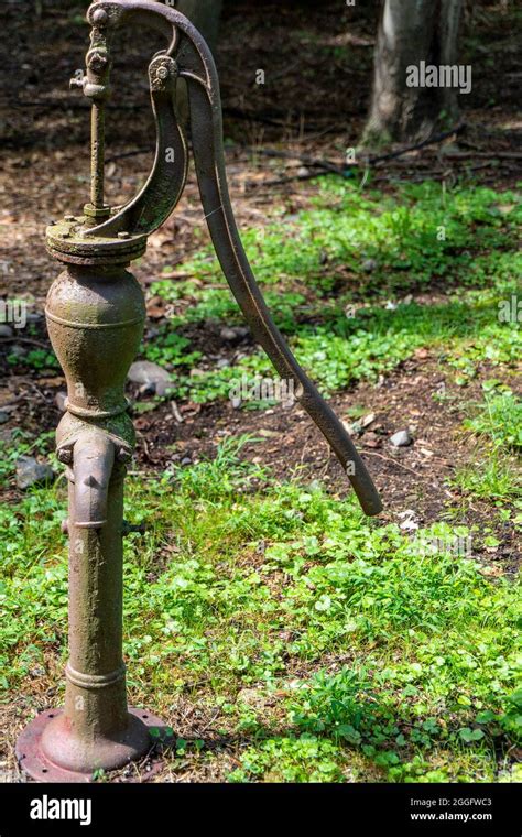 An old well water pump Stock Photo - Alamy