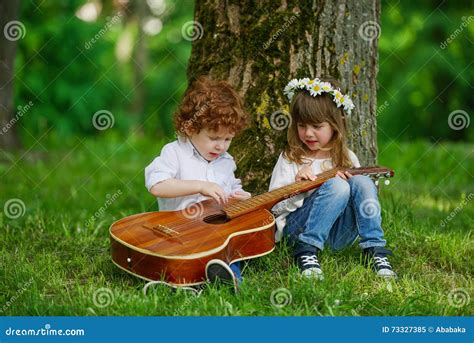 Cute Children Playing Guitar Stock Image - Image of color, children ...