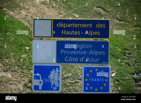 Road Sign On Mountain Pass Col Du Calibier Border Of Savoy And Hautes