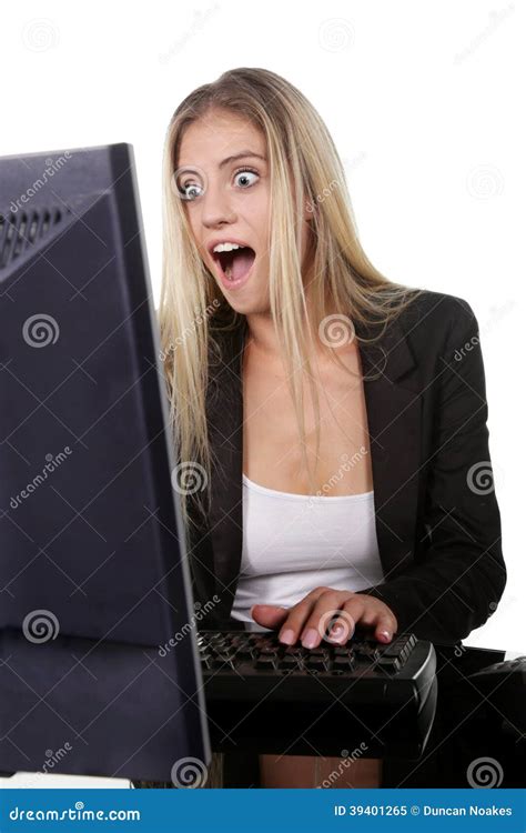 Shocked Or Surprised Blonde Office Lady At Her Desk Royalty Free Stock