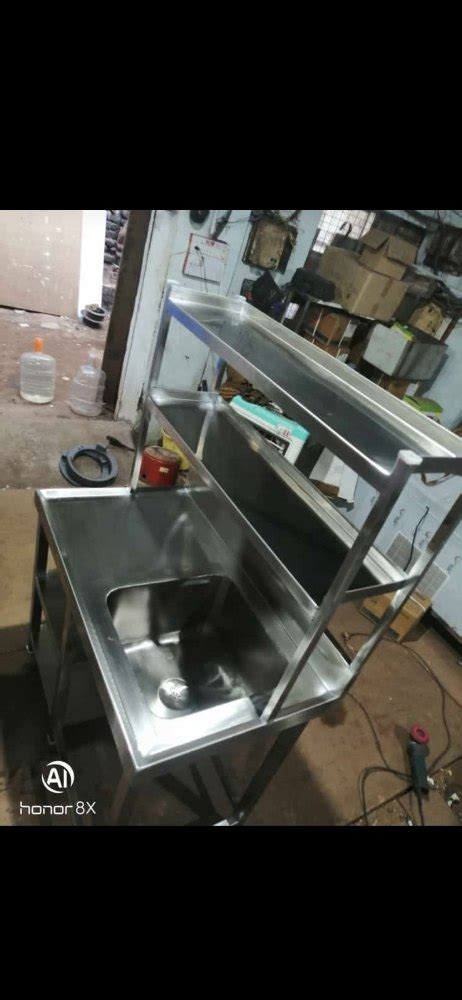 A Kitchen Silver Stainless Steel Work Table With Sink Sink Shape