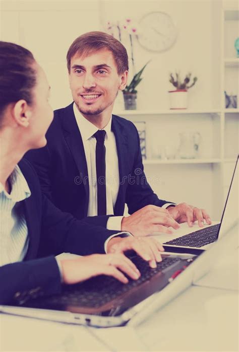 Man And Woman Coworkers Working On Computers Stock Image Image Of