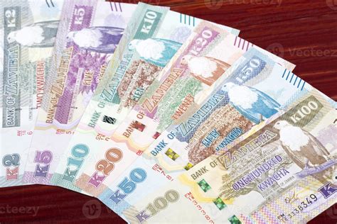 Zambian kwacha a business background 21570866 Stock Photo at Vecteezy