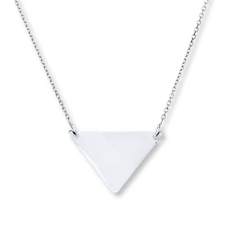 An Inverted Triangle Crafted In Gleaming Sterling Silver Is The