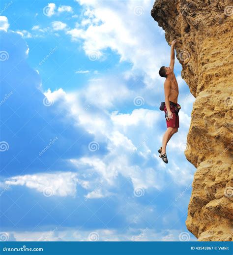 Guy Hanging On Rock Stock Photo Image 43543867