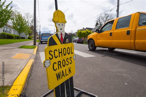 School crossing sign Stock Photo | Adobe Stock