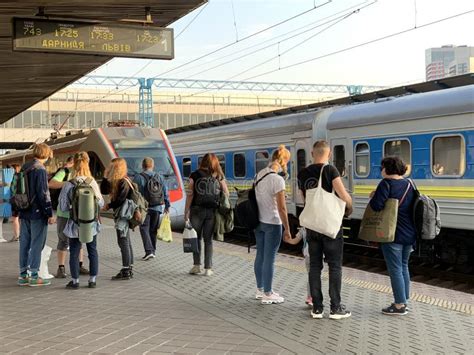 People On The Platform Of The Station Are Waiting For The Train Men