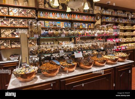 Belgian Chocolates On Display Inside A Chocolate Shop In Brussels