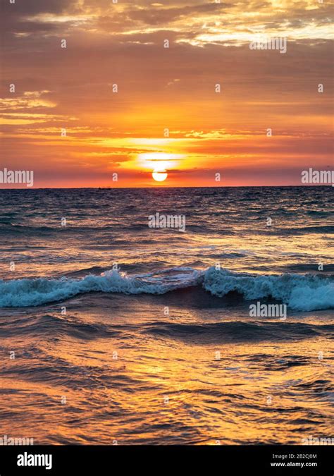 Sunset At Kuta Beach In Bali Indonesia Stock Photo Alamy