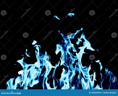 Abstract Background Of Blue Flame Fire On Black Background Stock Photo