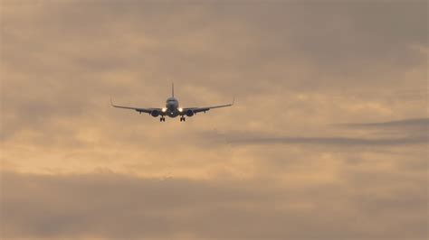 Slow Motion Footage Of A Jet Plane Approaching Landing Passenger