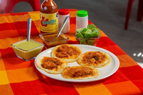 A Tortilla Chips Near the Salsa on a Bowl · Free Stock Photo