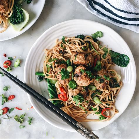 ASIAN MEATBALLS ON RICE NOODLES WITH A CHILLI GINGER AND SESAME SAUCE