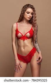 Beautiful Longhaired Woman Posing Red Lingerie Stock Photo