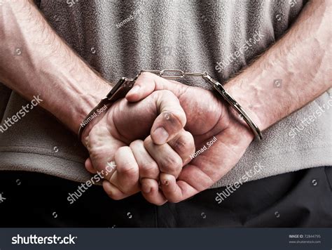 Criminal Hands Locked Handcuffs Closeup View Stock Photo 72844795