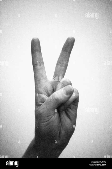 Peace sign hand Black and White Stock Photos & Images - Alamy