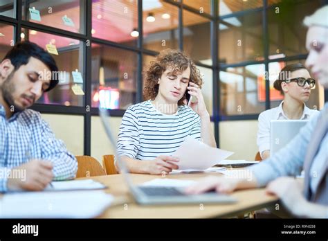 Busy office workers Stock Photo - Alamy