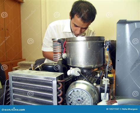 engineer fixing machine royalty  stock photo cartoondealercom
