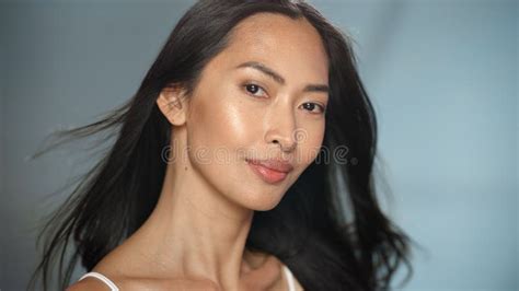 Female Beauty Portrait Beautiful Asian Brunette Woman Posing On Camera Smiling Stock Photo