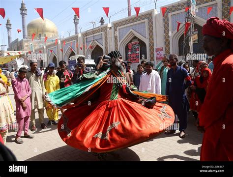 March 22, 2022, Sehwan, Sindh, Pakistan: Devotees perform Dhamal during ...