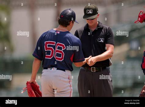 Umpire Andrew Craddock Checks Fcl Red Sox Pitcher Nate Tellier 56 During A Florida Complex